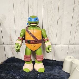 Green and Orange Action Figure  teenage muntant turtle toy